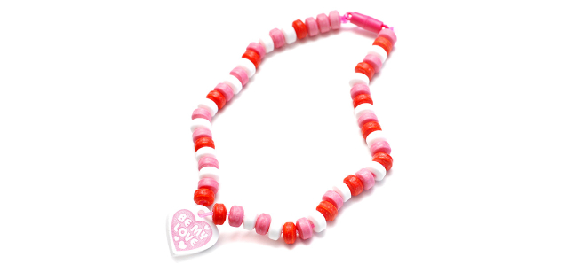 Necklace with white and pink pony beads with heart shape in the middle