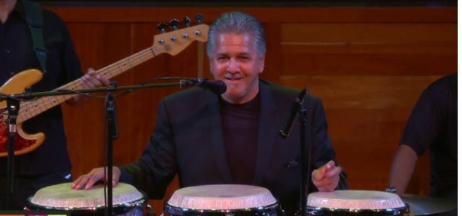 louie cruz beltran playing drums