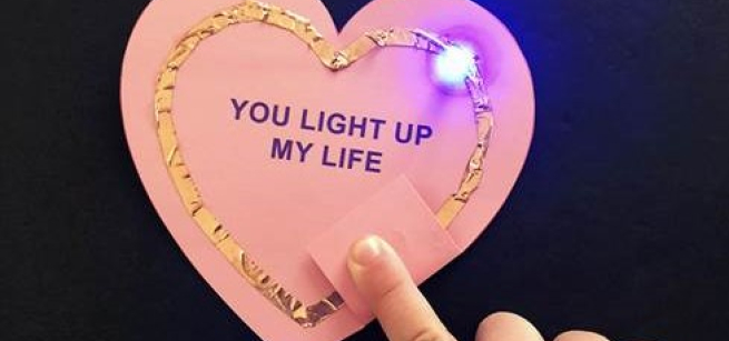 Circuit on top of a pink heart.