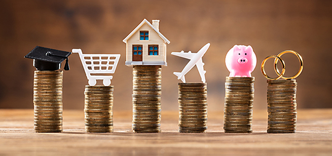 stacks of coins with different items on top of each stack