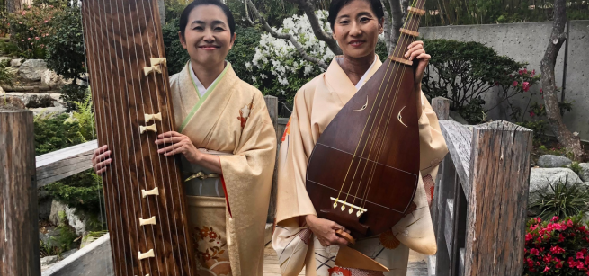Two women holding a biwa and koto