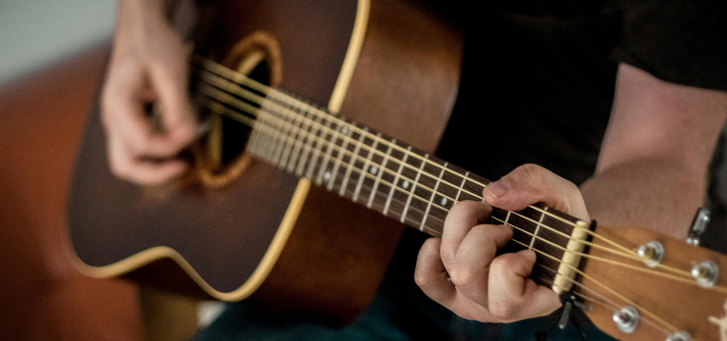 person playing guitar
