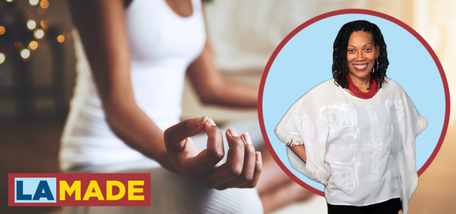 yoga person in background with a close up photo of regina queen