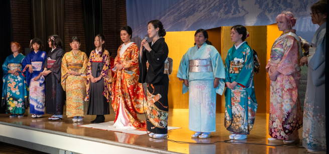 group of ladies in kimonos on a stage