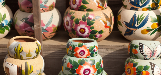 Painted terracotta pots with Southwestern motifs