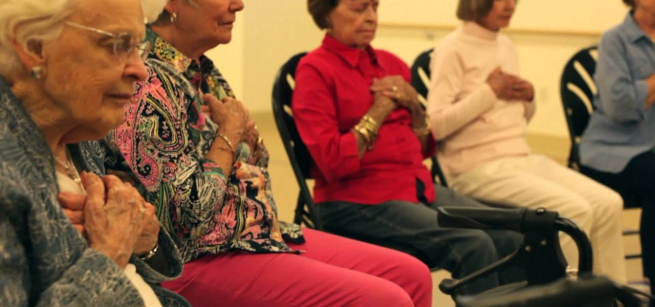 elderly people meditating