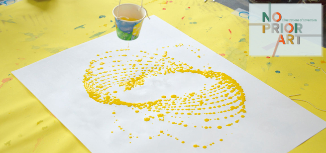 Pendulum with yellow paint dripping to paper creating a design.