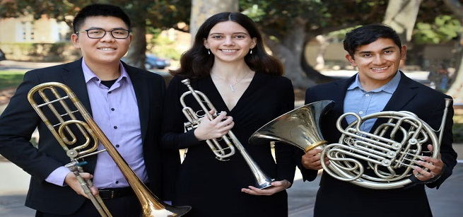 Two men and one woman holding different brass instruments