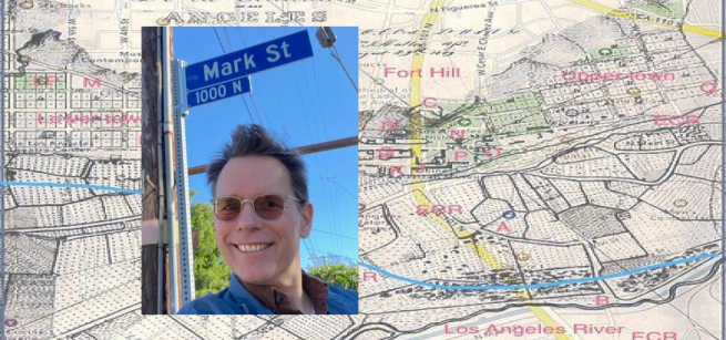 Photograph of Mark Tapio Kines with a Los Angeles map in the background