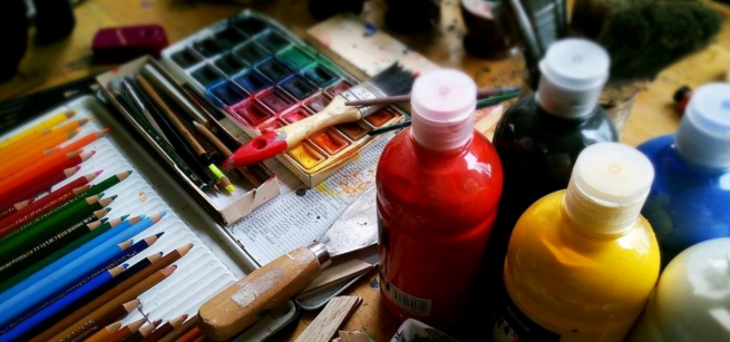 Color pencils, watercolors, acrylic paints are in the picture