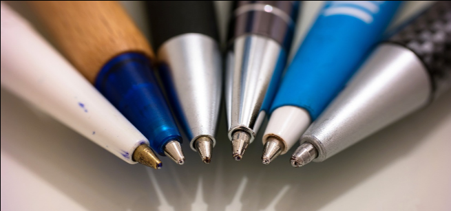 6 pens are arranged in a semi circle