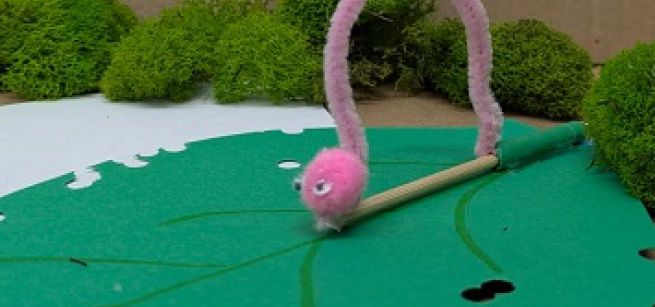 craft with pipecleaner, pom pom, and paper