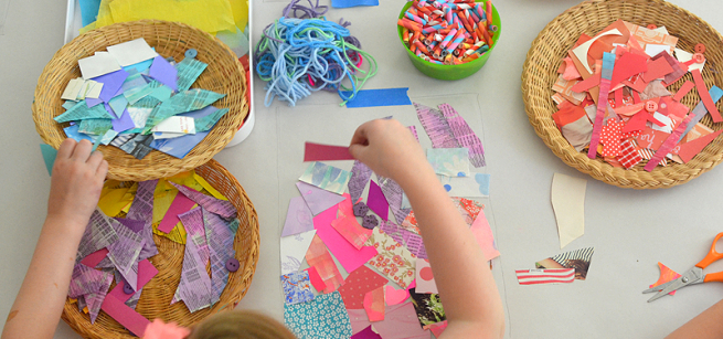 kids using scraps to create a collage on contact paper