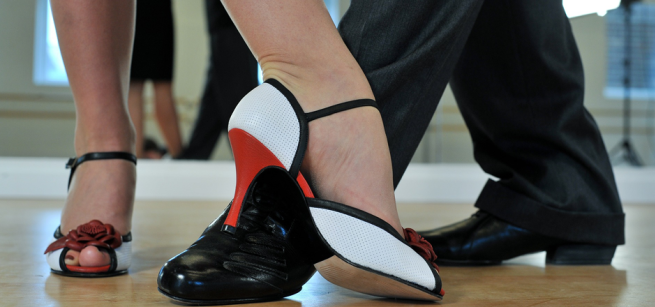 Feet in ballroom dance shoes