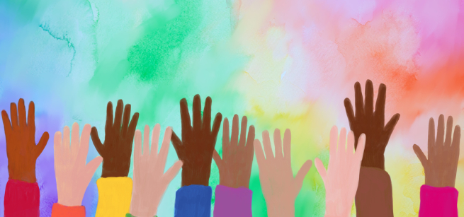 children with hands up in air against rainbow colors