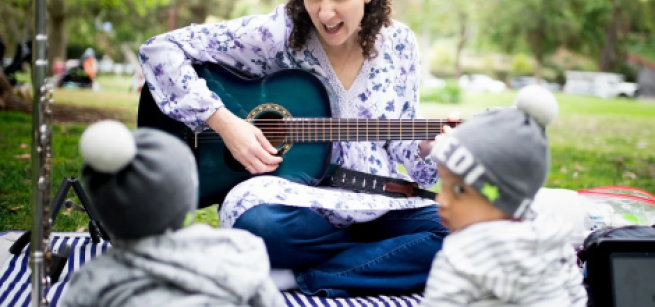 music and stories, singing, playing guitar and flute, children's program