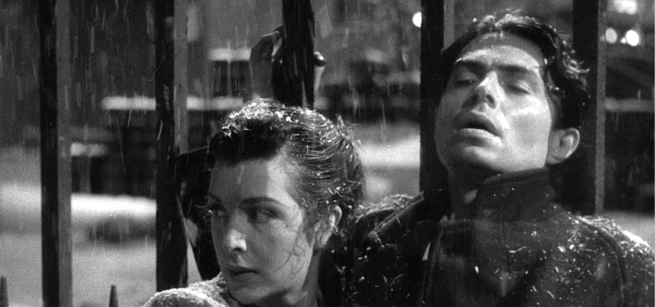 The male and female protagonists are standing under the rain