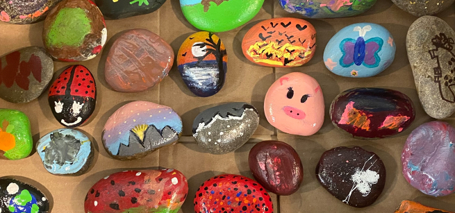 Colorfully painted rocks with various designs