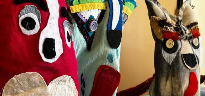 three homemade puppets