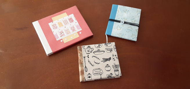 Three handcrafted books shown as a sample.