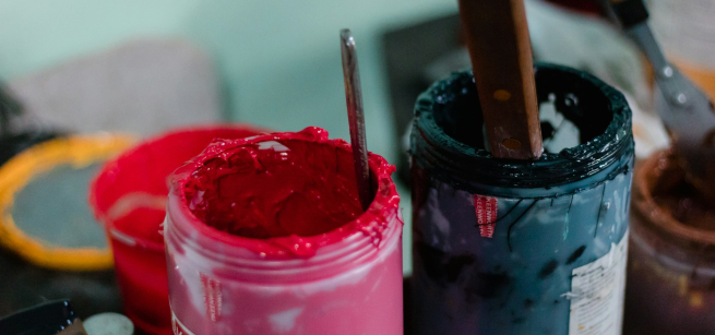 This is a photo of two containers with paint.