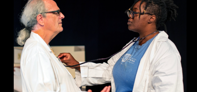 Two performers on stage