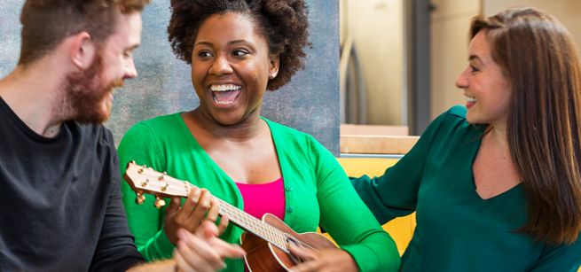 People playing a ukulele