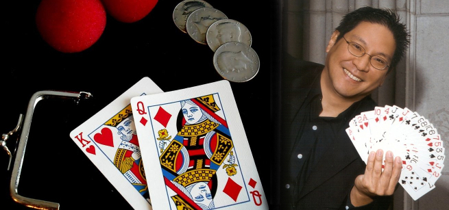 A photograph of magic show props alongside an image of magician "Magic Wayne" who is smiling and holding a fanned deck of face cards in his hand.
