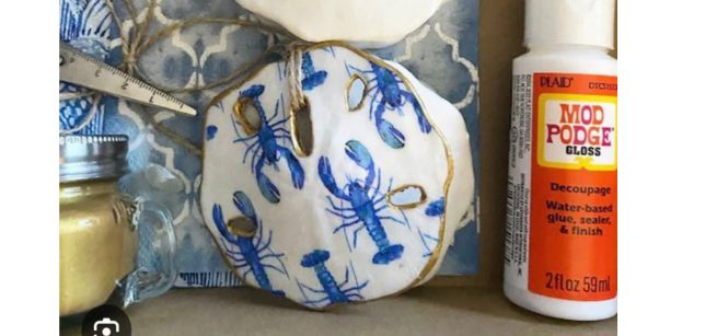 modpodge sea shell using decorative paper