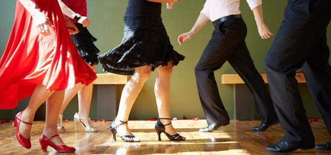 Couples dancing salsa