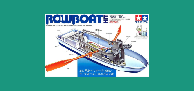A drawing of a miniature battery-powered rowboat kit with English and Japanese writing