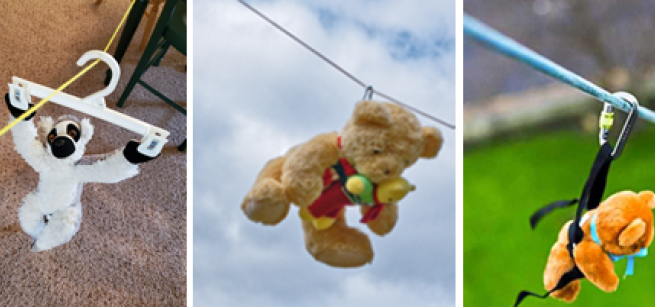 stuffed animal monkey and 2 bears gliding down zip line