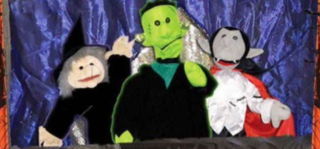 A Frankenstein puppet, a witch puppet and a Count Dracula puppet