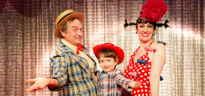 April, Jared and their son, Gatsby Benjamin Whitham, take the stage