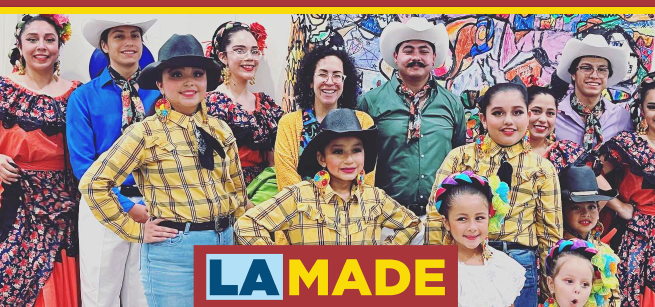 Various Mexican folk dancers of all ages dressed in traditional costume