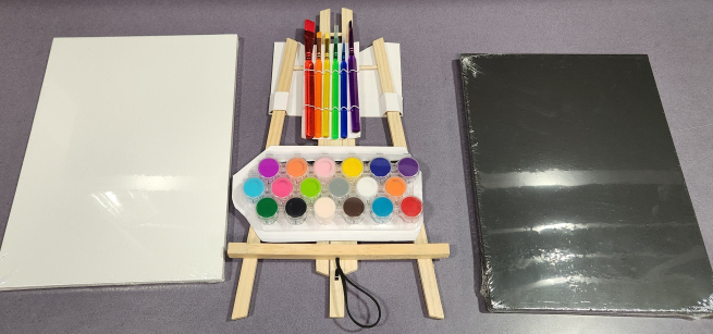 A canvas, easel and painting tools