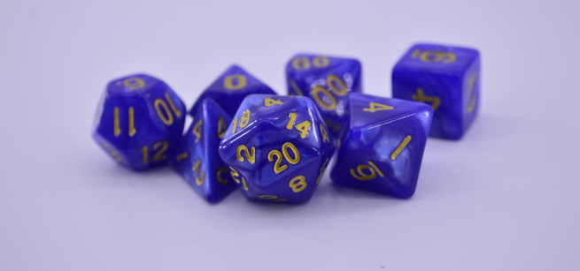 set of purple multi-sided dice
