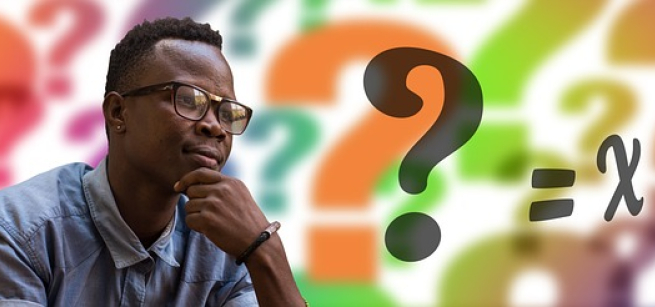 A picture of a Black man, thinking, with colorful question marks in the background. Image by Gerd Altmann from Pixabay