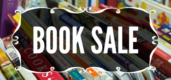 Words "Book Sale" on the background of books