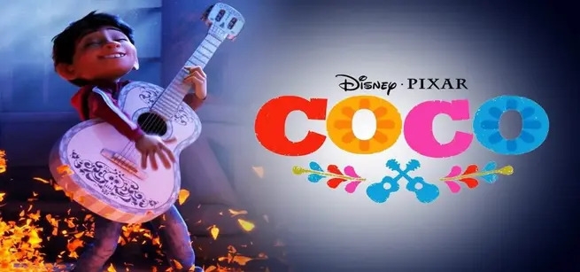 A young boy is playing his guitar next to the movie's logo.