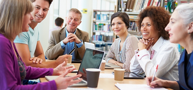 People discussing a book
