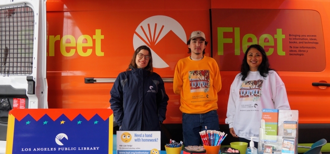 Street Fleet van and Street Fleet staff at an event 