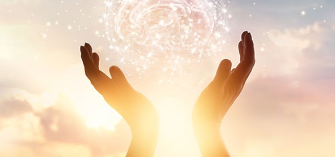 Sunlight through upraised hands.