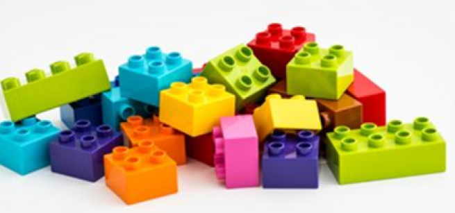 Pile of different colored plastic bricks.