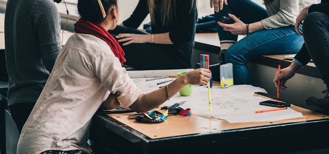 students sitting around a table