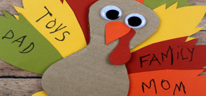 Turkey with various colored wings and each wing with thankful notes to love ones.