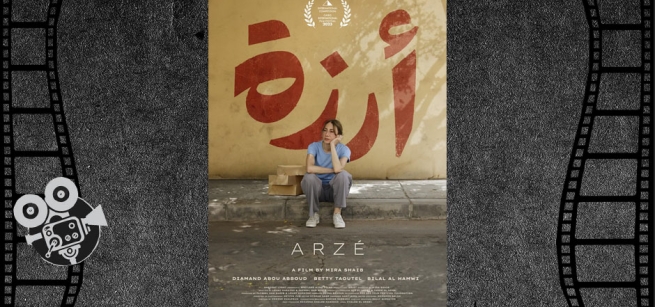 A woman seated on a curb