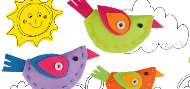 Colorful fabric birds against a cartoon sunshine and cloudy sky