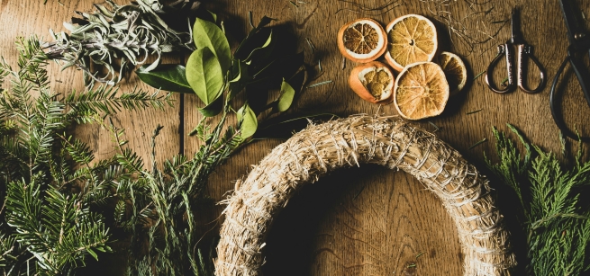 brown wreath green leaves dried orange slices