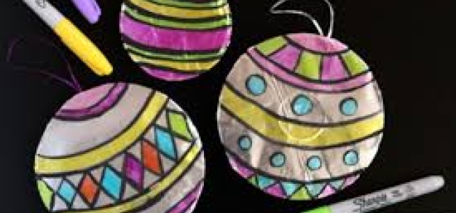 Three Tin Art ornaments. 